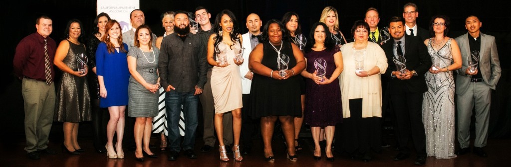 Danielle Lacey Photography Honorees at the Mark of Distinction Awards pose with their awards. 