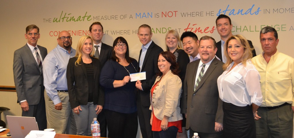 MEMBERS OF CAA GREATER INLAND EMPIRE PRESENT A CHECK FOR $10,000 TO INLAND EMPIRE UNITED WAY. PHOTO BY MATT BUCK 