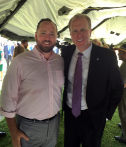 Whitney Benzian, executive director of CAA San Diego, and Maylor Kevin Faulconer at a press conference about the Homes For Heroes program. 